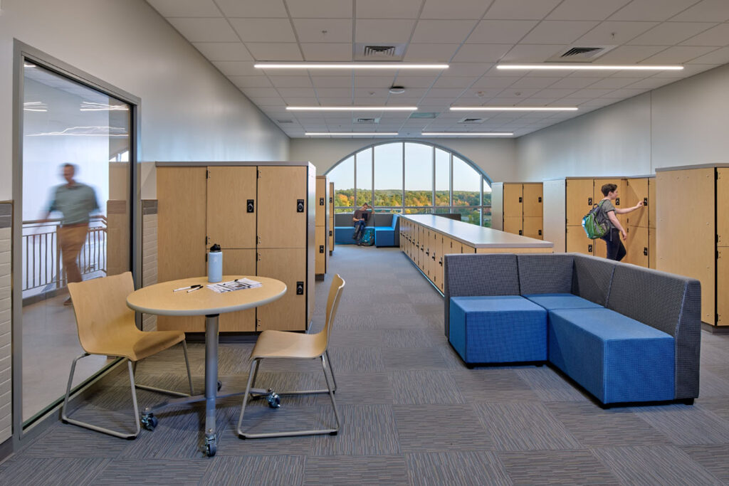 A view of Morse high School third floor lockers, seating, and student lounge area